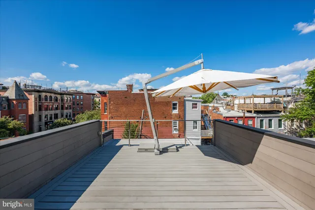 a house view with a wooden floor and a potted plant