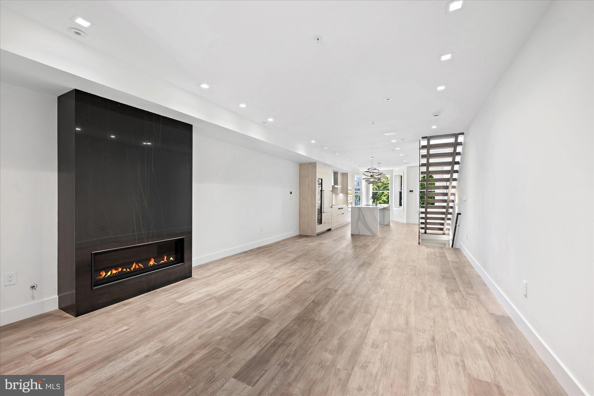 1777 T Street Northwest, Unit 5 Washington, DC 20009 - Photo 6 of 48 a view of an empty room with wooden floor