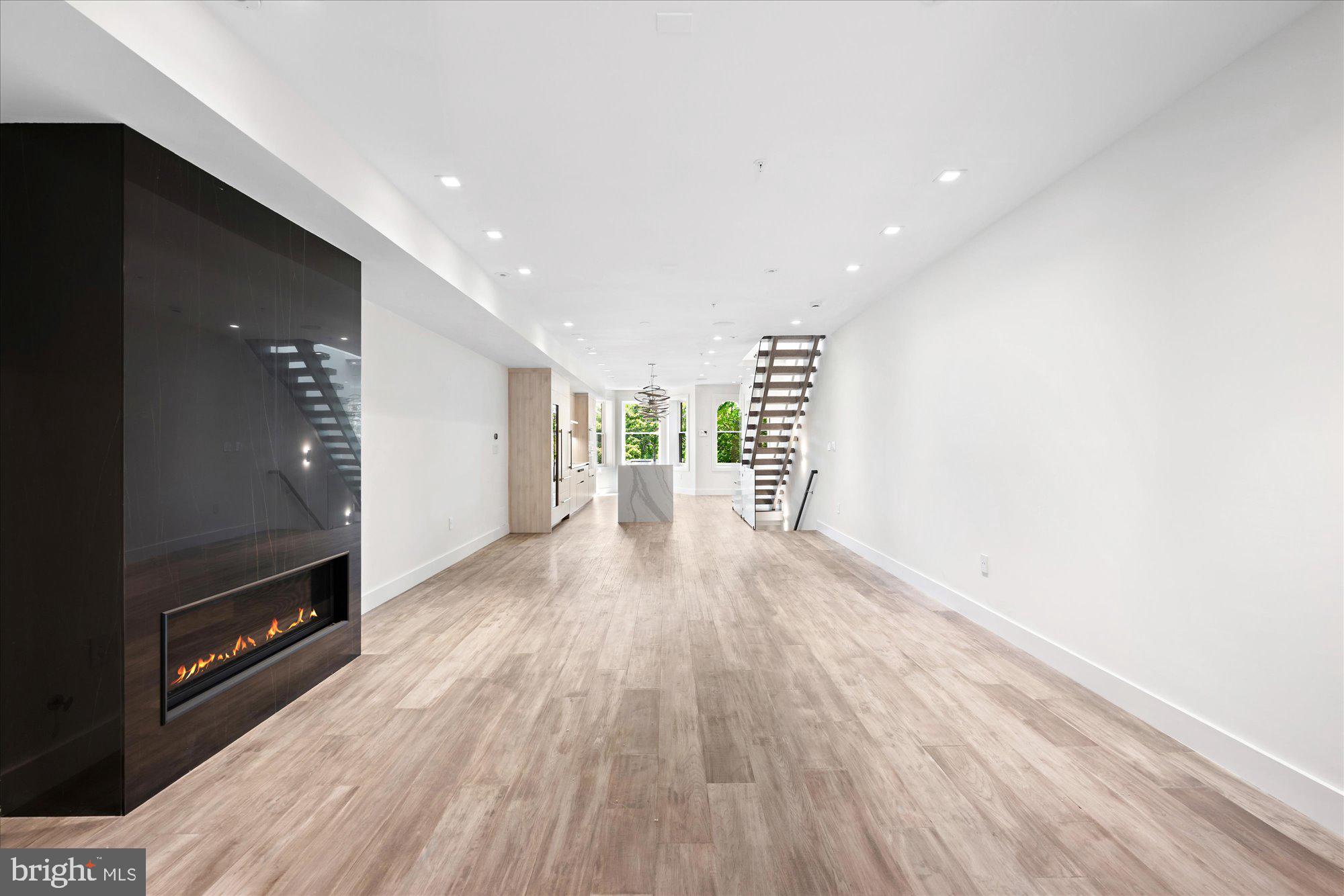 1777 T Street Northwest, Unit 5 Washington, DC 20009 - Photo 7 of 48 a view of a room with wooden floor