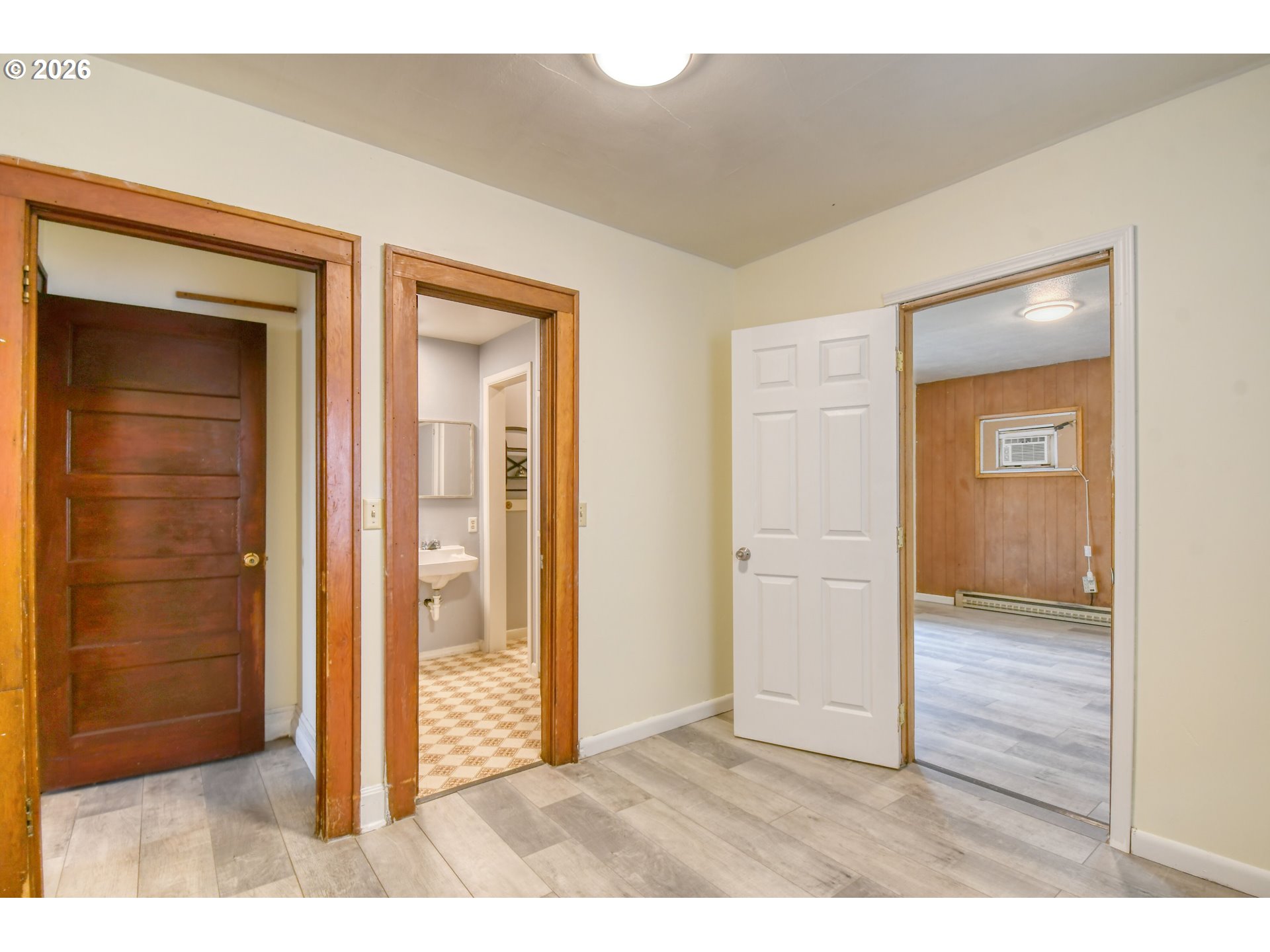 1716 Southeast Court Avenue Pendleton, OR 97801 - Photo 19 of 43 a view of an empty room with closet and wooden floor