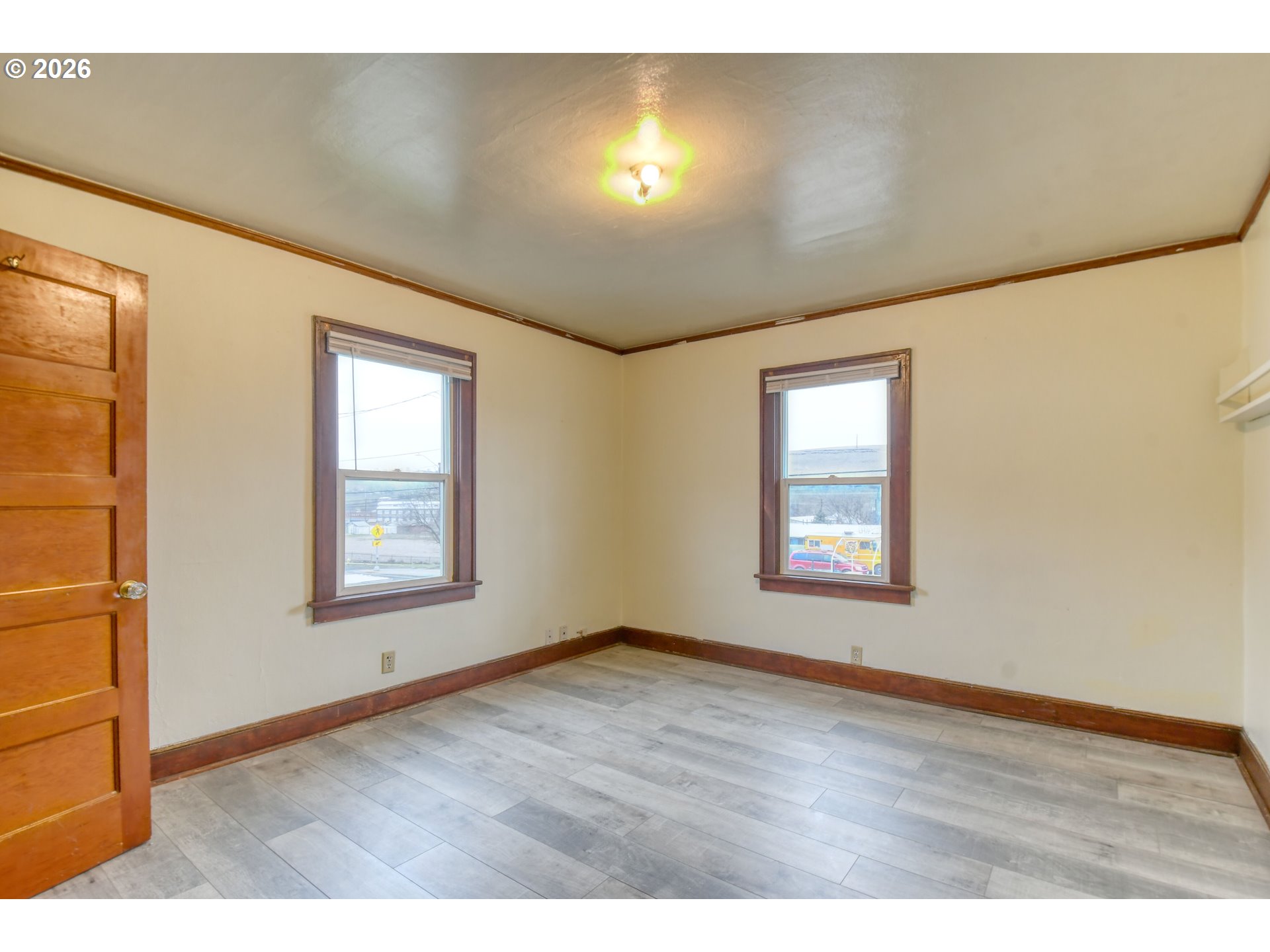 1716 Southeast Court Avenue Pendleton, OR 97801 - Photo 29 of 43 a view of an empty room with wooden floor and a window