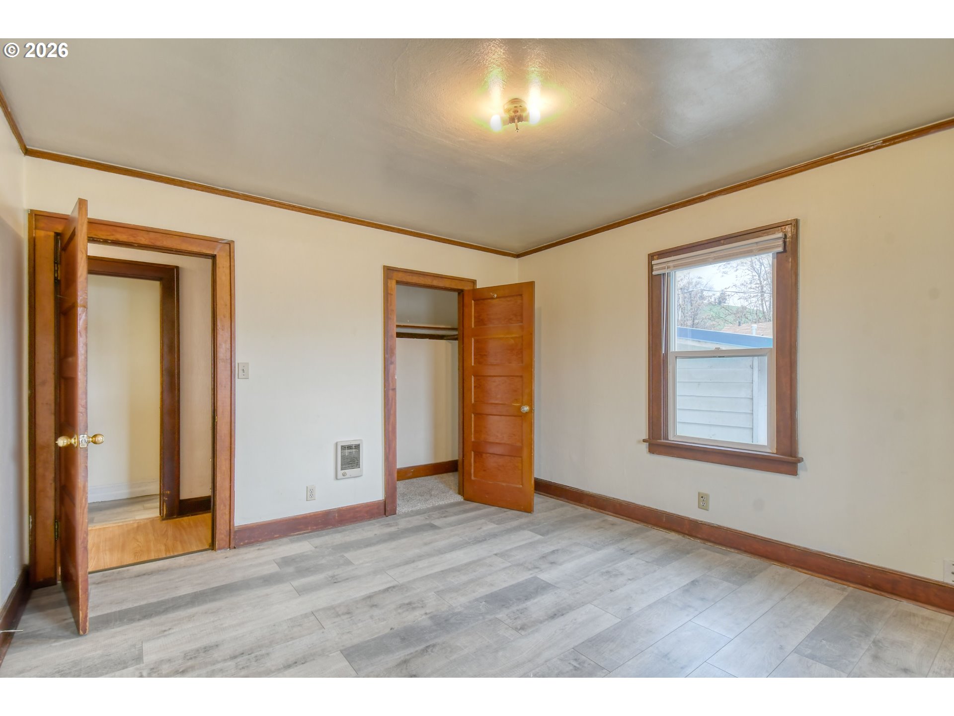 1716 Southeast Court Avenue Pendleton, OR 97801 - Photo 30 of 43 a view of an empty room with wooden floor and a window