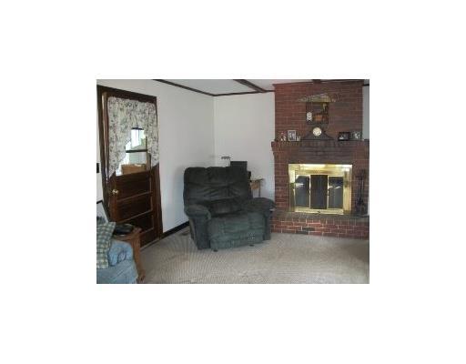 600 Shaker Road New Gloucester, ME 04260 - Photo 8 of 25 Living Room. Brick Hearth