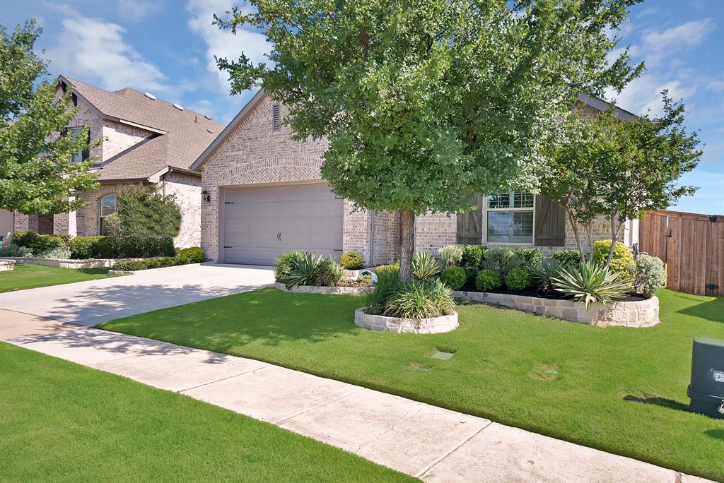 1709 Shetland Road Aubrey, TX 76227 - Photo 28 of 35 a front view of a house with a yard