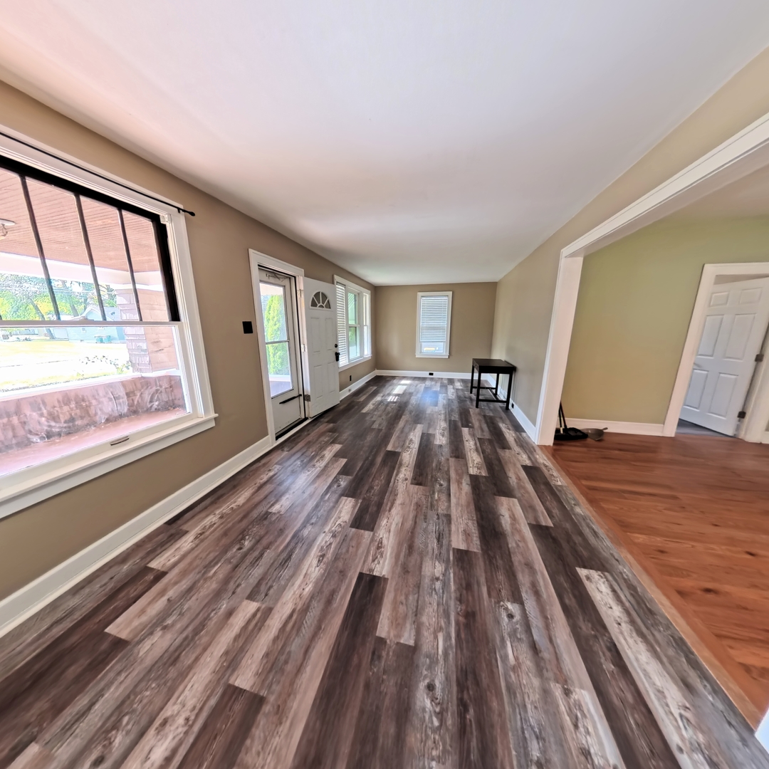 118 West 3rd Street Streator, IL 61364 - Photo 7 of 29 a view of a house with wooden floor and furniture