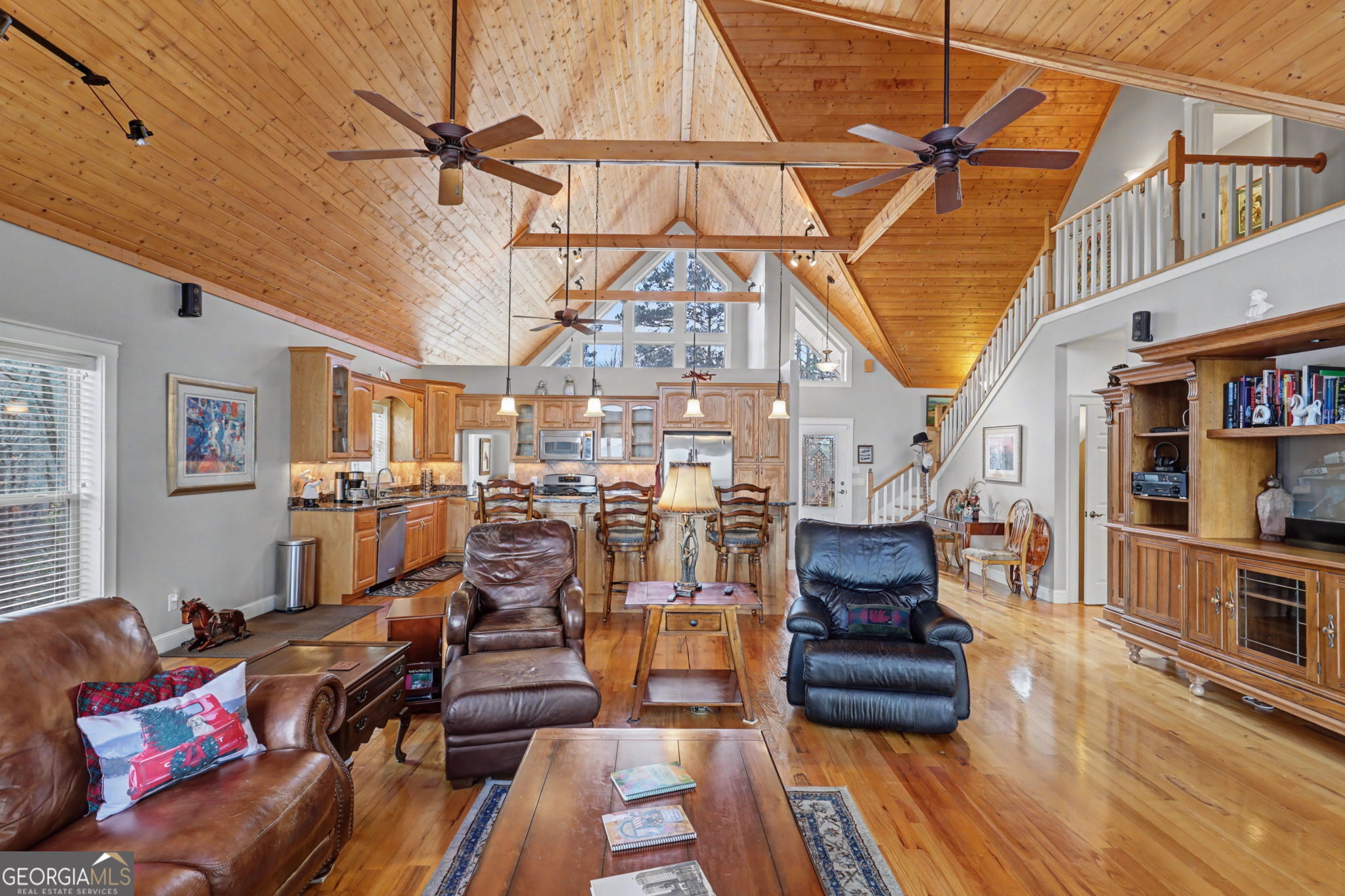 1176 Tiger Pass Drive Tiger, GA 30576 - Photo 22 of 67 a view of a living room with furniture and a wooden floor