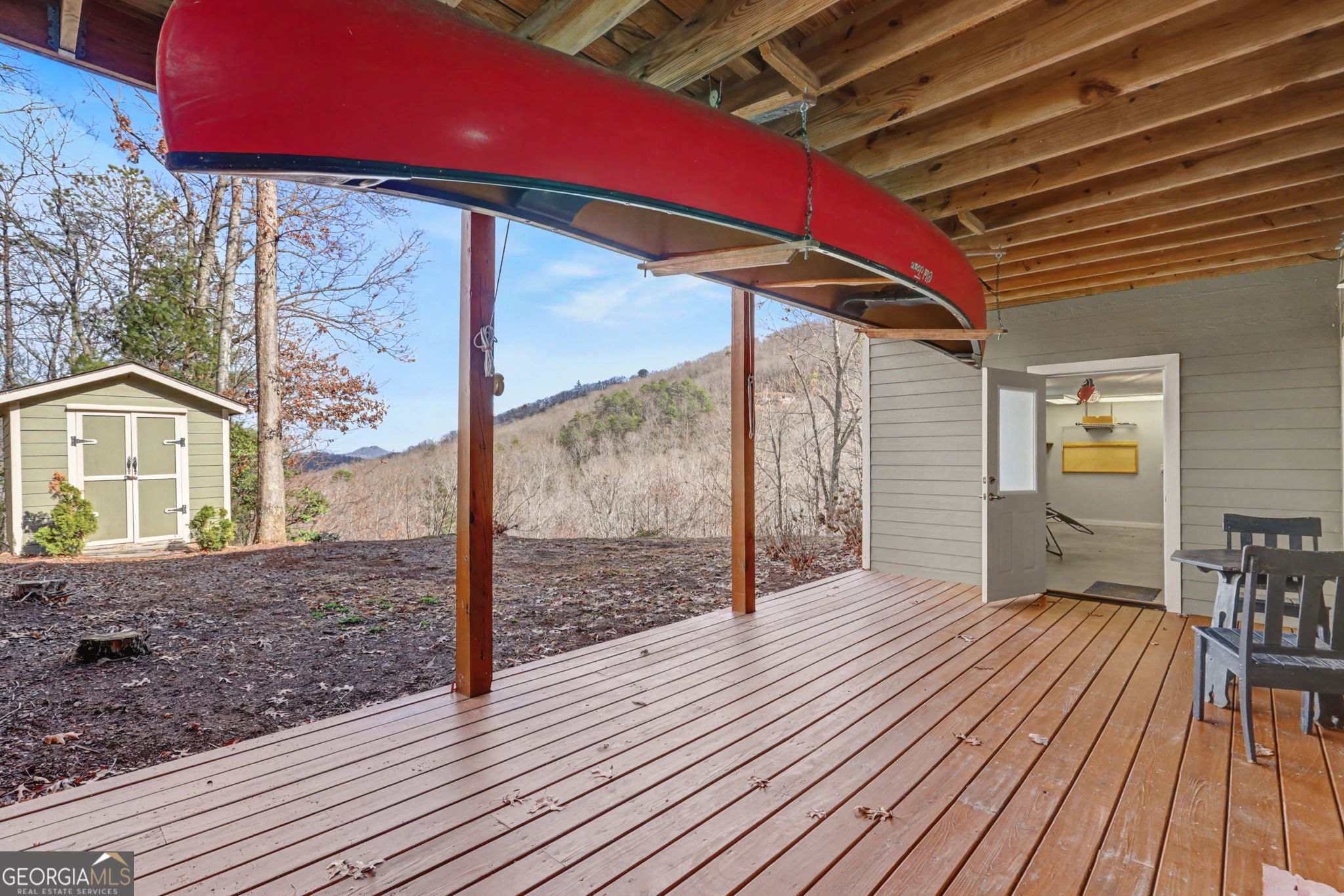 1176 Tiger Pass Drive Tiger, GA 30576 - Photo 58 of 67 a view of a porch with wooden floor