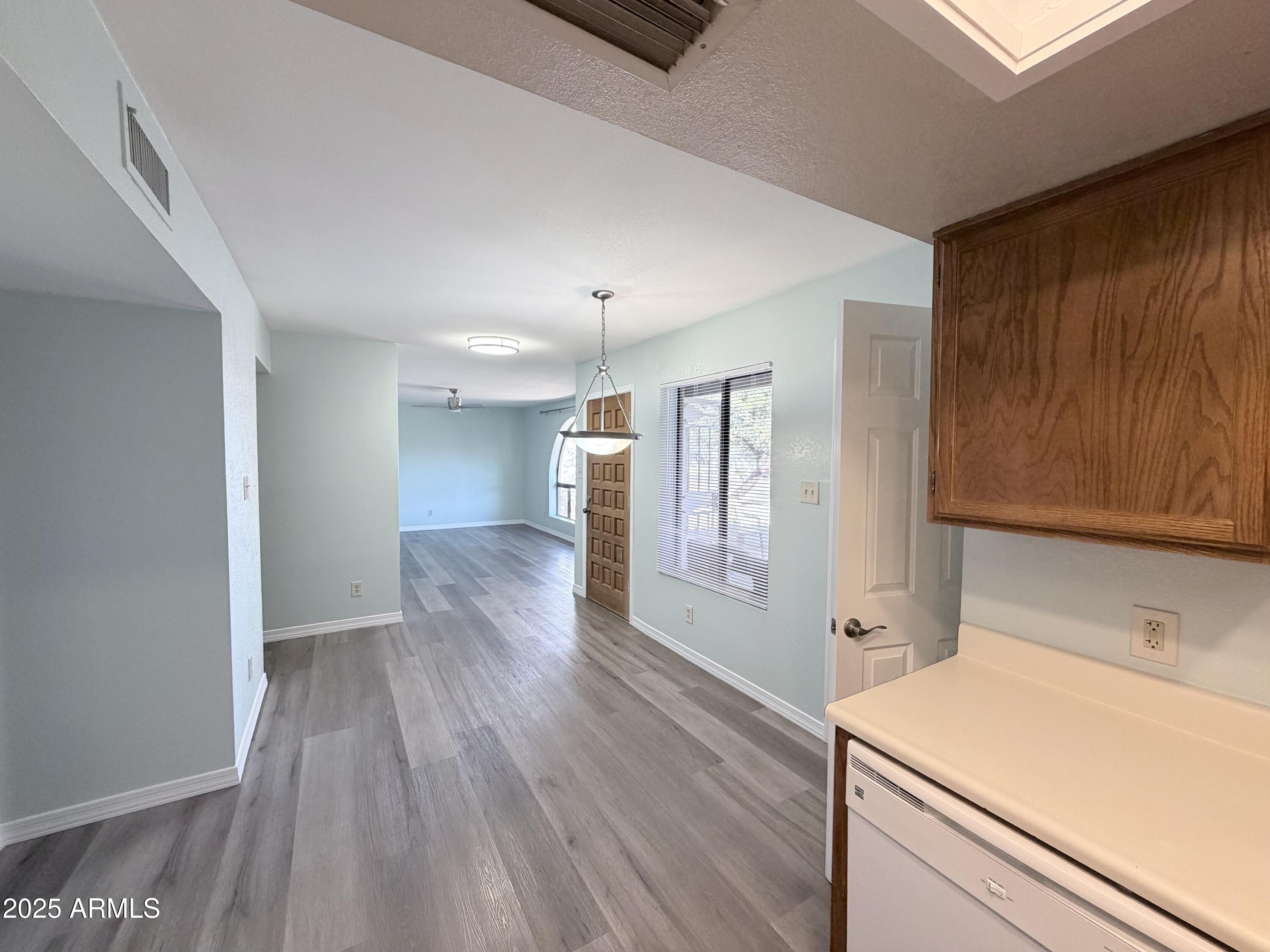 14220 North Galatea Drive, Unit B Fountain Hills, AZ 85268 - Photo 4 of 22 Dinner Table, & Family Room Areas