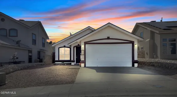 a view of a house with a garage