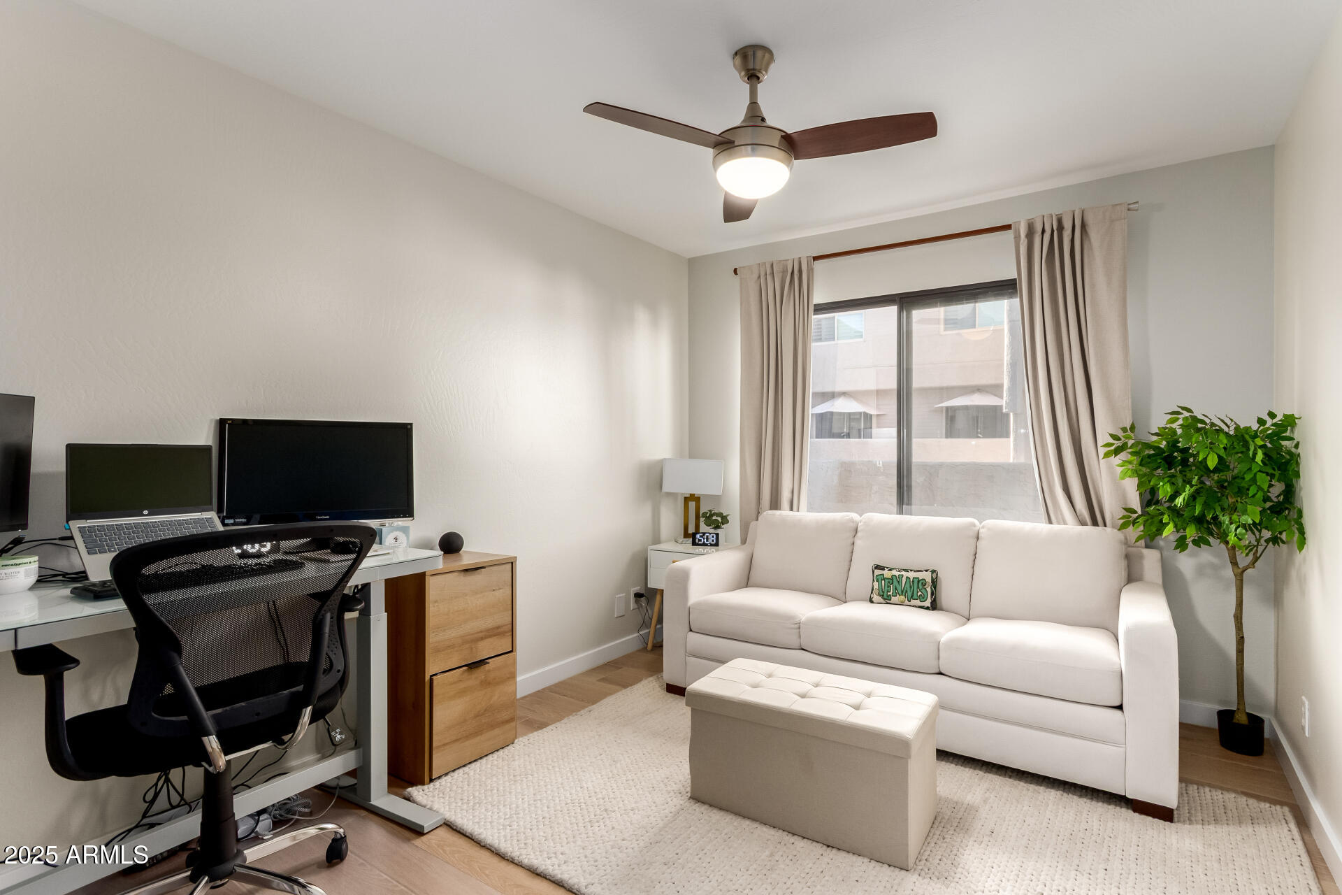 1207 East Northshore Drive, Unit 136 Tempe, AZ 85283 - Photo 13 of 49 a living room with furniture and a flat screen tv
