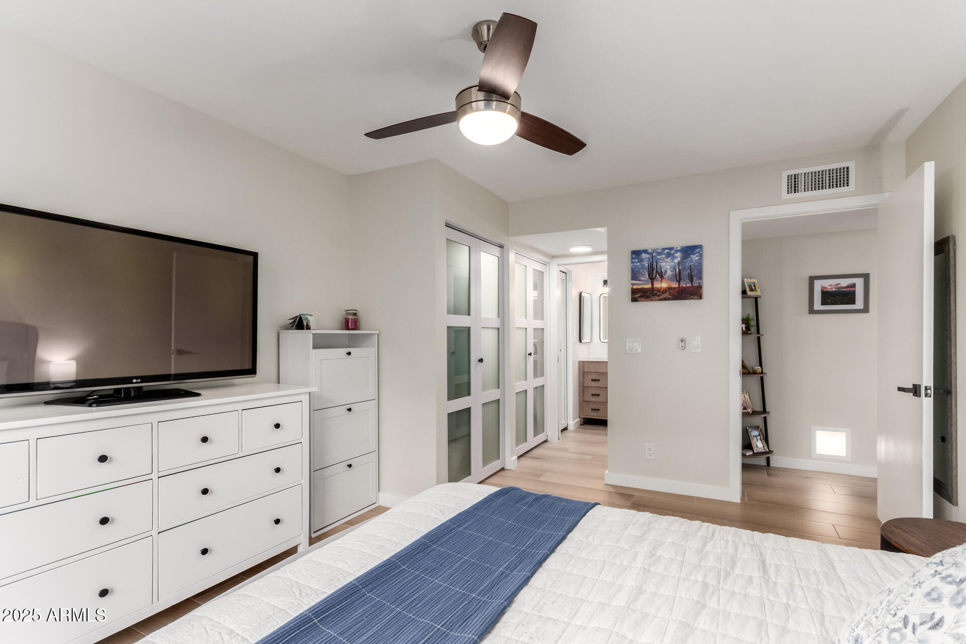 1207 East Northshore Drive, Unit 136 Tempe, AZ 85283 - Photo 19 of 49 a living room with furniture and a flat screen tv