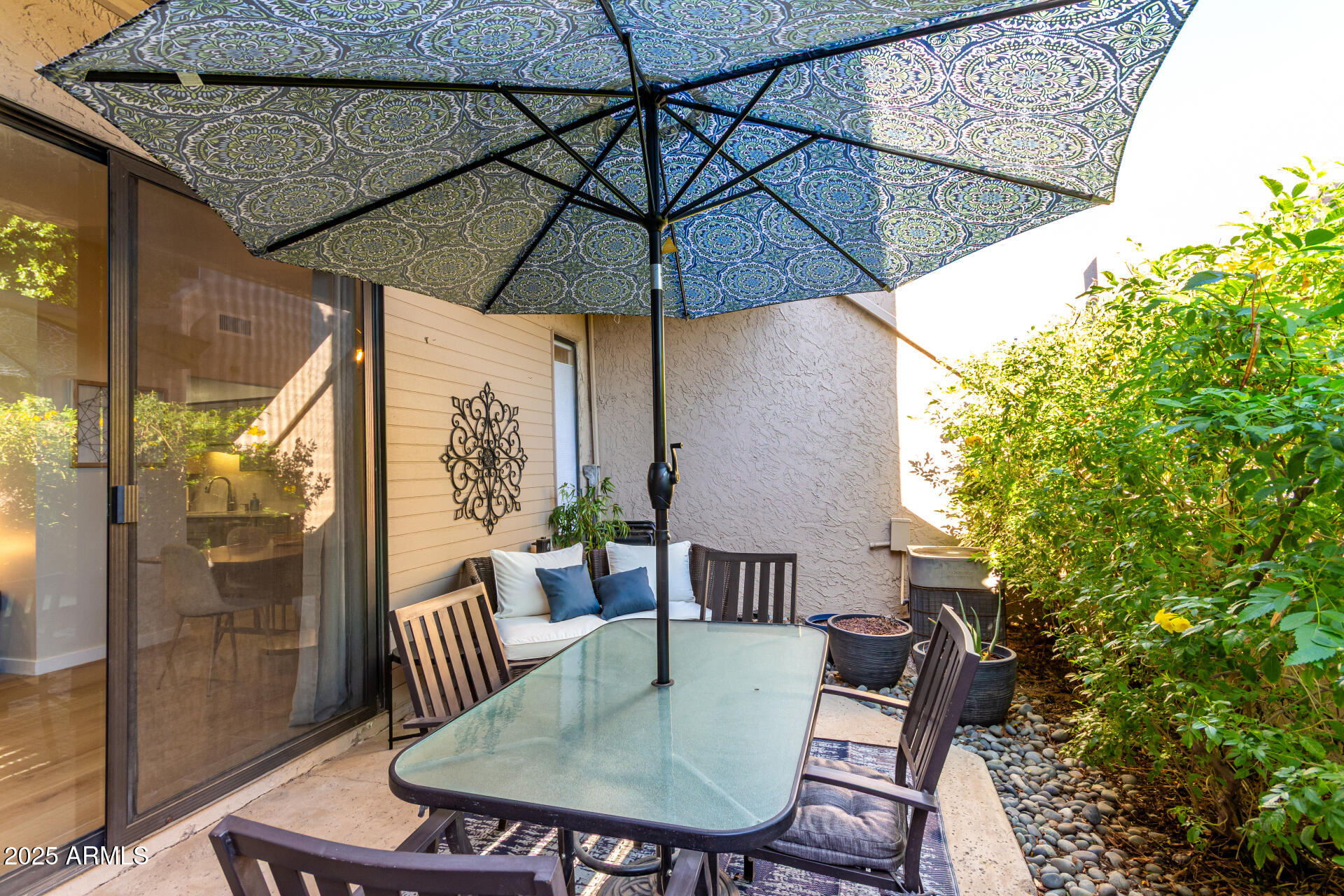 1207 East Northshore Drive, Unit 136 Tempe, AZ 85283 - Photo 25 of 49 a view of balcony with furniture and umbrella