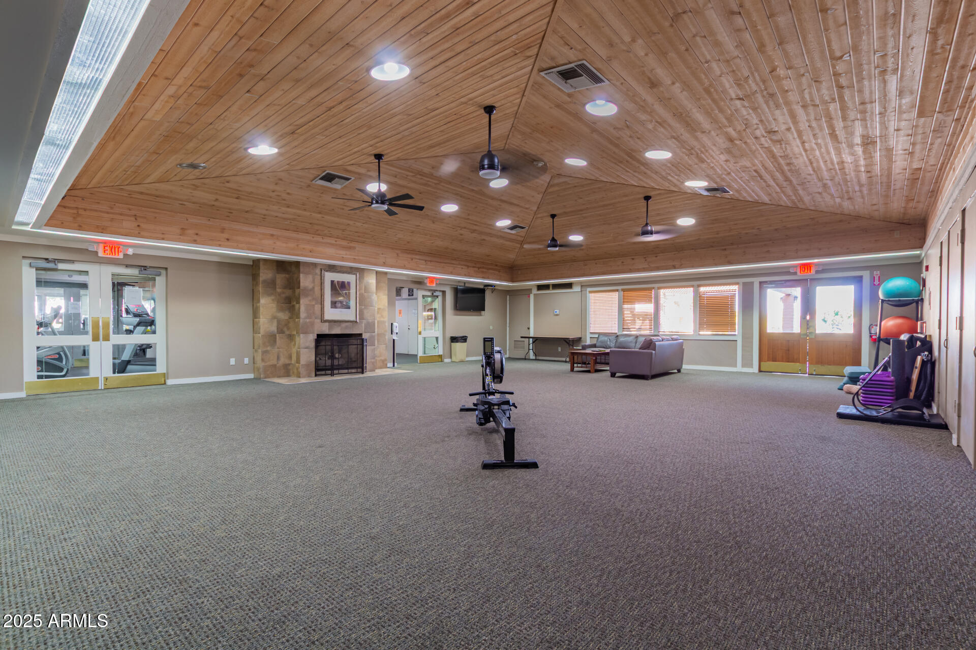 1207 East Northshore Drive, Unit 136 Tempe, AZ 85283 - Photo 42 of 49 a living room with furniture and a chandelier