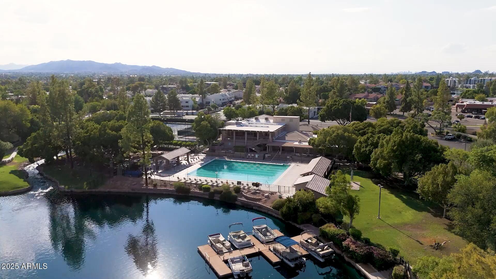 1207 East Northshore Drive, Unit 136 Tempe, AZ 85283 - Photo 48 of 49 a view of a lake in middle of the town