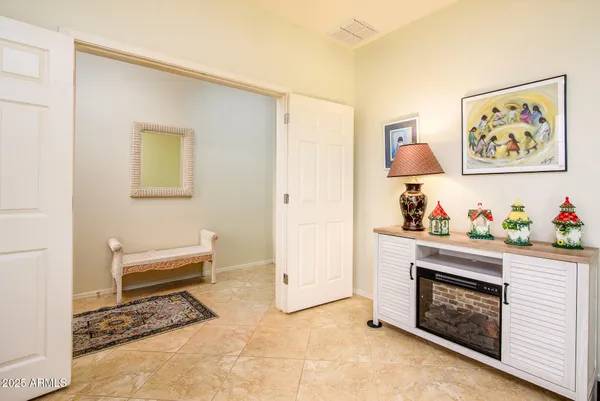 a bathroom with a granite countertop toilet a sink and a shower