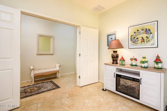 a bathroom with a granite countertop toilet a sink and a shower