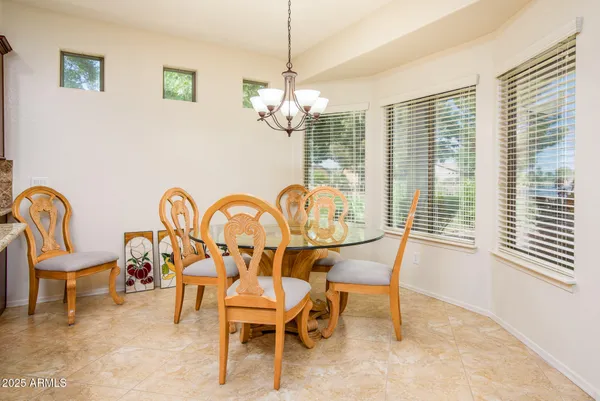a view of a workspace with furniture