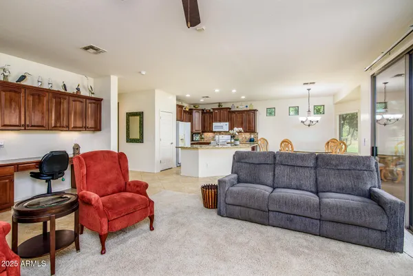 a bathroom with a granite countertop sink shower and a mirror