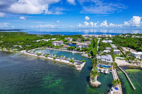 a view of a balcony with an outdoor space and seating area