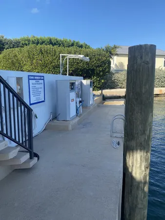 a view of a chairs and table in the patio