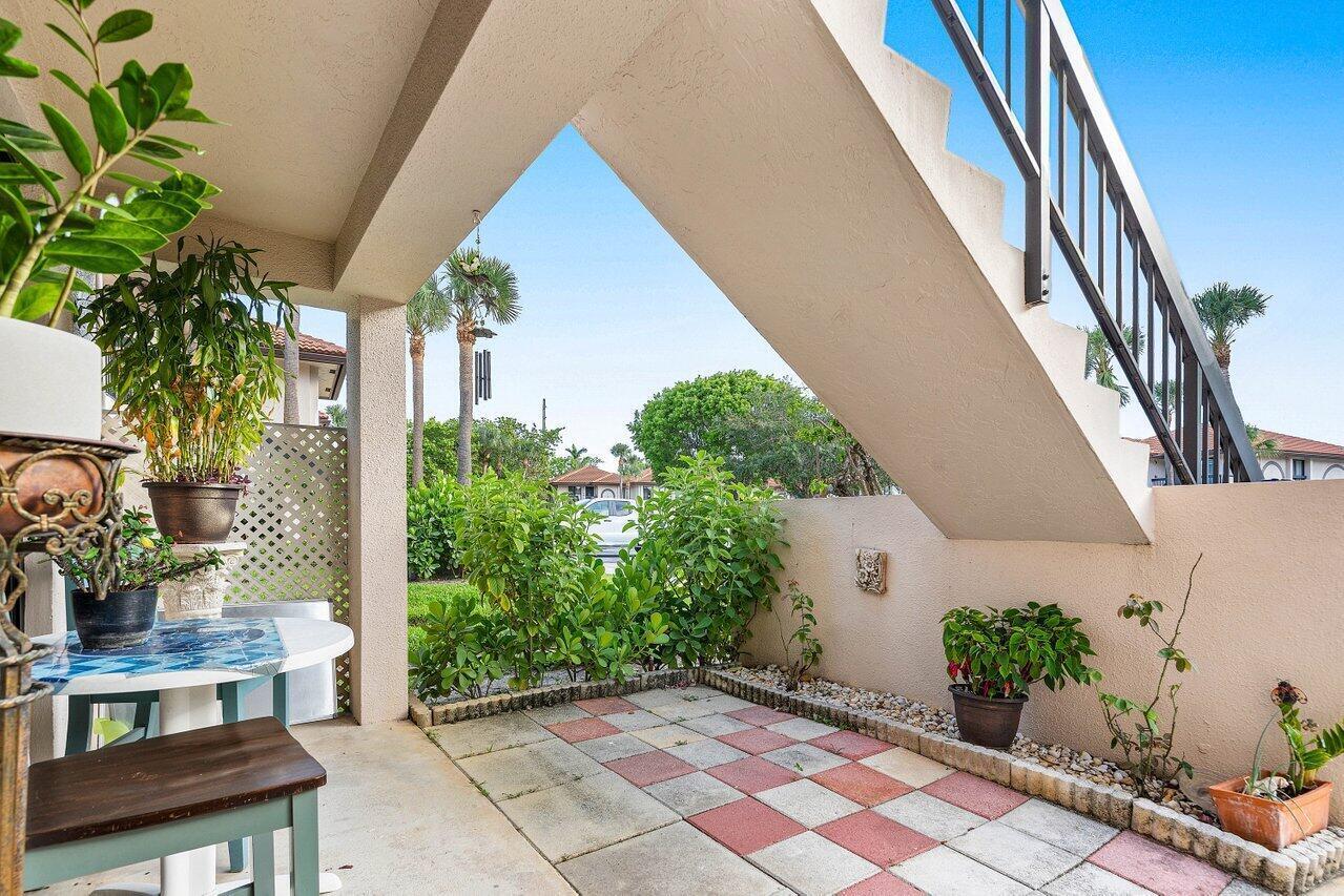 5200 East Club Circle, Unit 106 Boca Raton, FL 33487 - Photo 1 of 31 006-5200EastClubCircle-106-BocaRaton-FL-