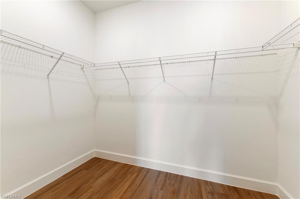 11929 Sacra Place Fort Myers, FL 33913 - Photo 21 of 50 a view of a room with racks on the wall