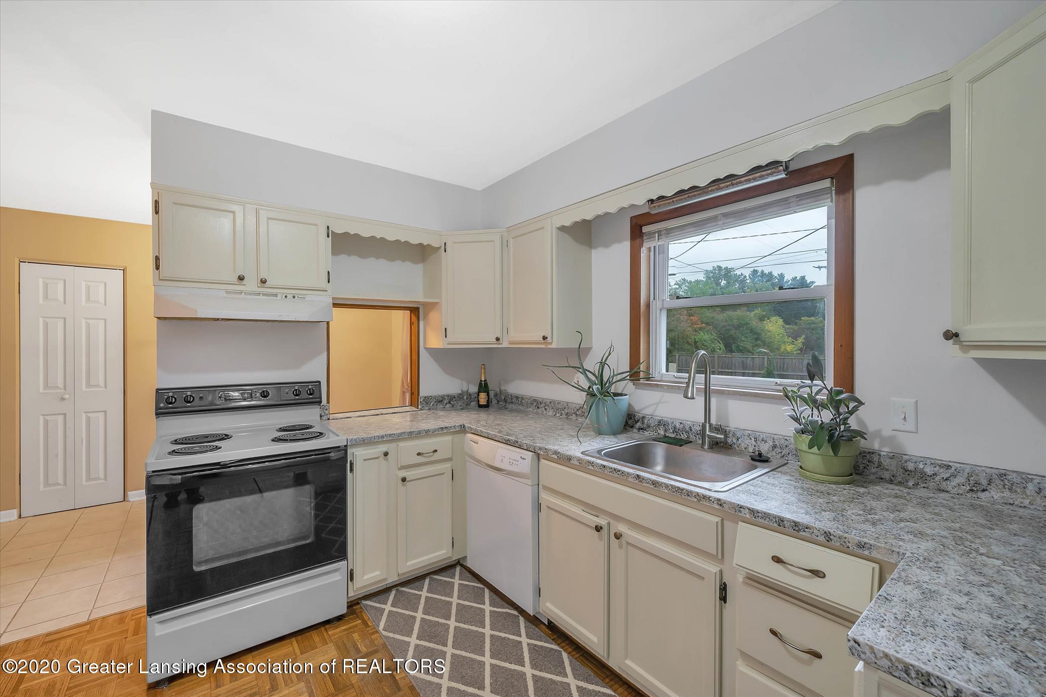 2173 Iroquois Road Okemos, MI 48864 - Photo 22 of 41 2173 Iroquois Rd-WindowStill-Rea (18)