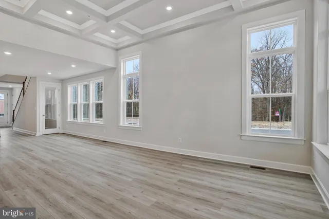 a large bathroom with a double vanity sink a large mirror and shower