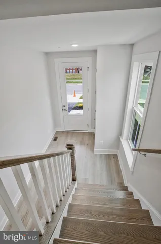 a bathroom with a sink vanity and mirror