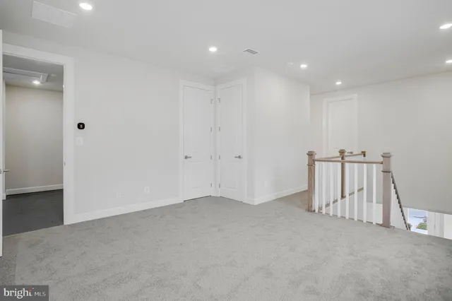 an empty room with a empty space and window