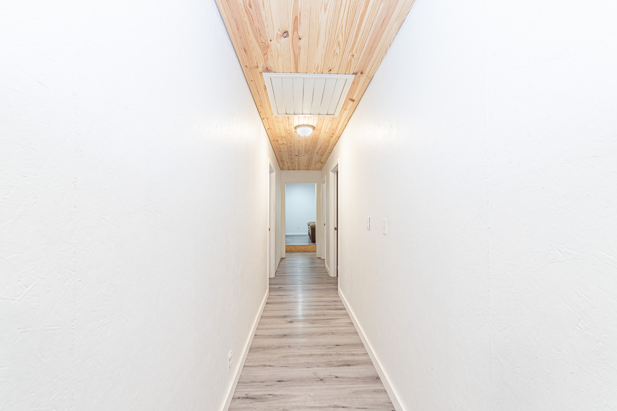 715 Mcgowen Road Morrison, TN 37357 - Photo 13 of 50 a view of a hallway with wooden floor and staircase
