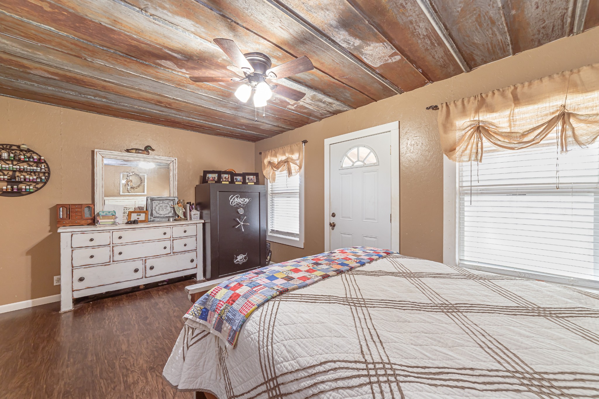 715 Mcgowen Road Morrison, TN 37357 - Photo 15 of 50 a bedroom with a bed and a dresser