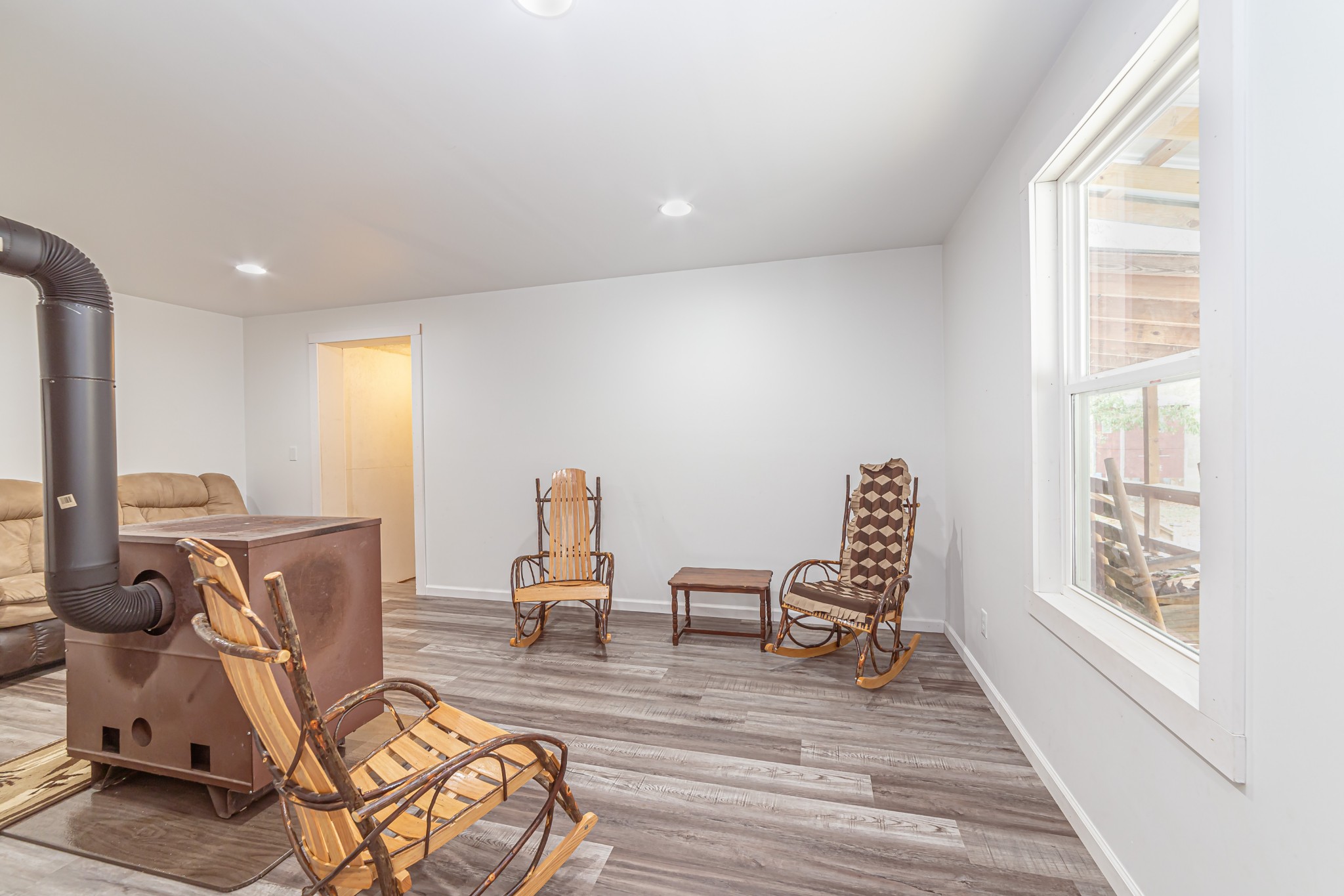 715 Mcgowen Road Morrison, TN 37357 - Photo 19 of 50 a view of a workspace with furniture and a window