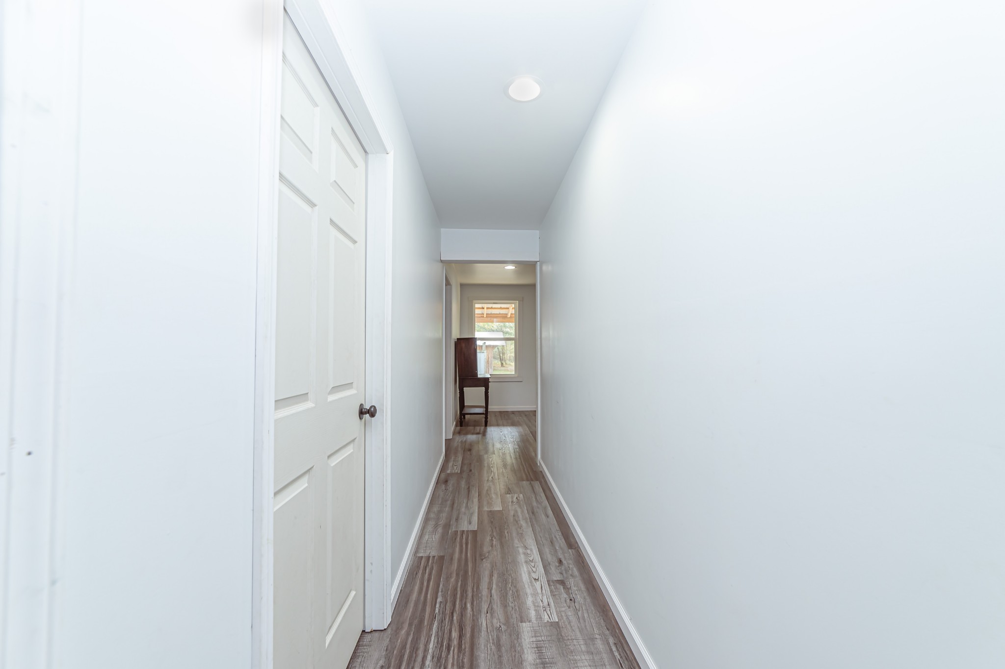 715 Mcgowen Road Morrison, TN 37357 - Photo 21 of 50 a view of a hallway with wooden floor