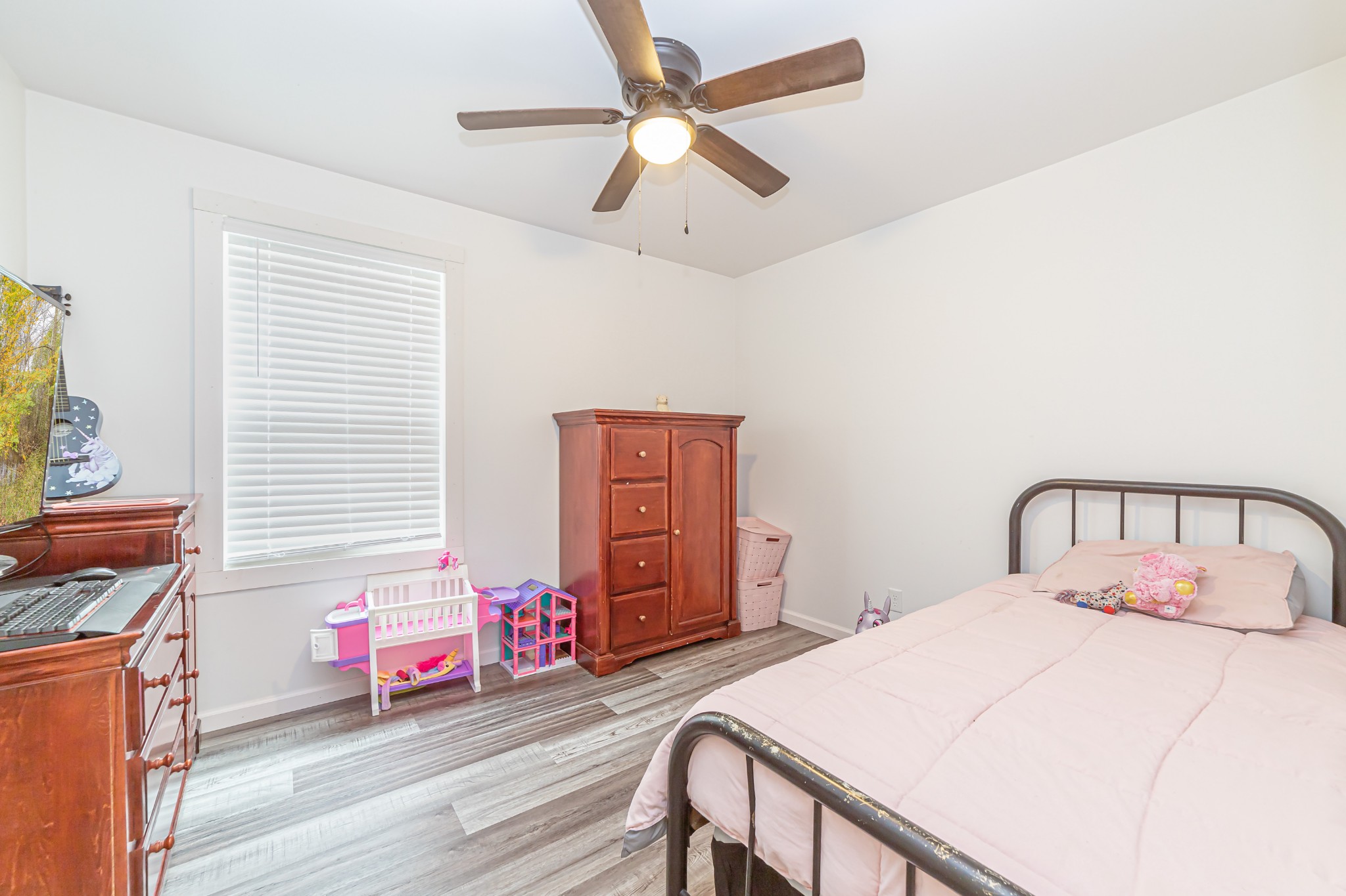 715 Mcgowen Road Morrison, TN 37357 - Photo 22 of 50 a bedroom with a bed dresser and a window