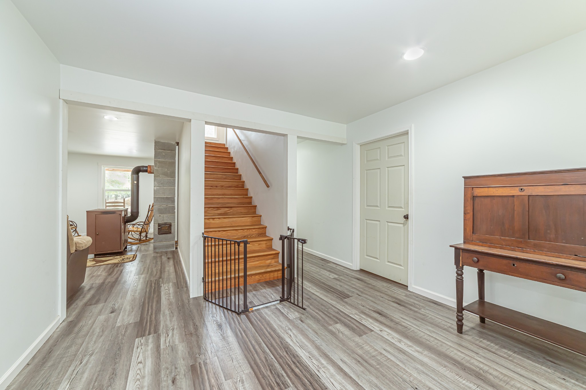 715 Mcgowen Road Morrison, TN 37357 - Photo 24 of 50 a view of a room with wooden floor lounge chair and windows