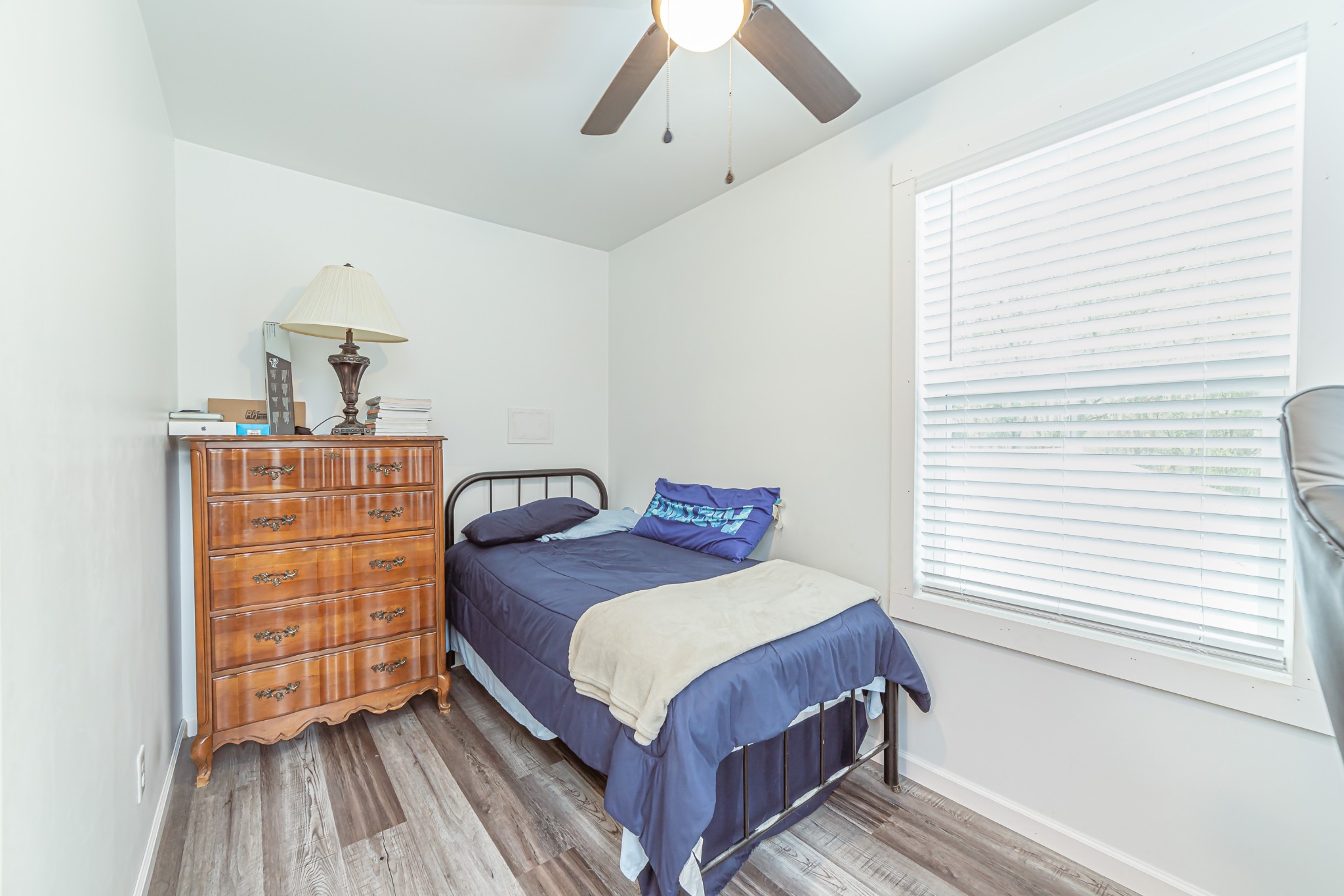 715 Mcgowen Road Morrison, TN 37357 - Photo 27 of 50 a bedroom with a bed and dresser
