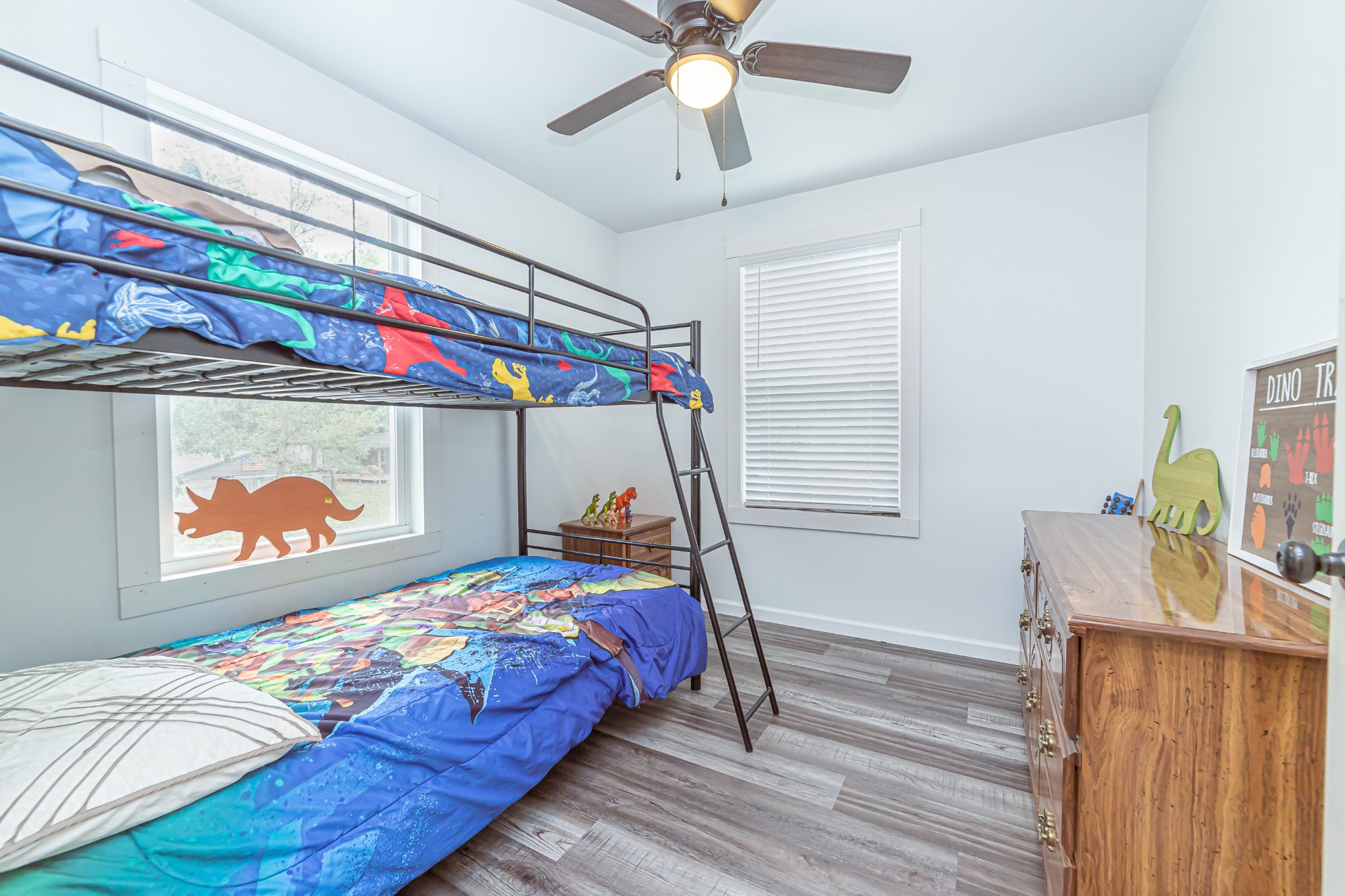 715 Mcgowen Road Morrison, TN 37357 - Photo 30 of 50 a bedroom with a bed and a dresser