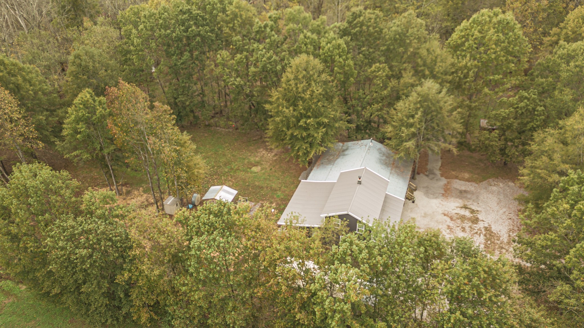 715 Mcgowen Road Morrison, TN 37357 - Photo 50 of 50 a aerial view of a house with a yard and a large tree