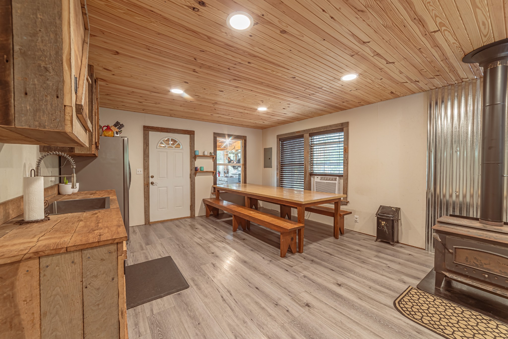 715 Mcgowen Road Morrison, TN 37357 - Photo 9 of 50 a spacious bedroom with a bed and wooden floor