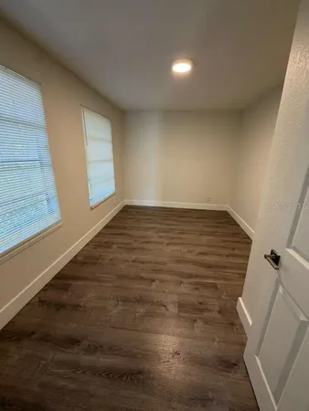 a view of an empty room and window