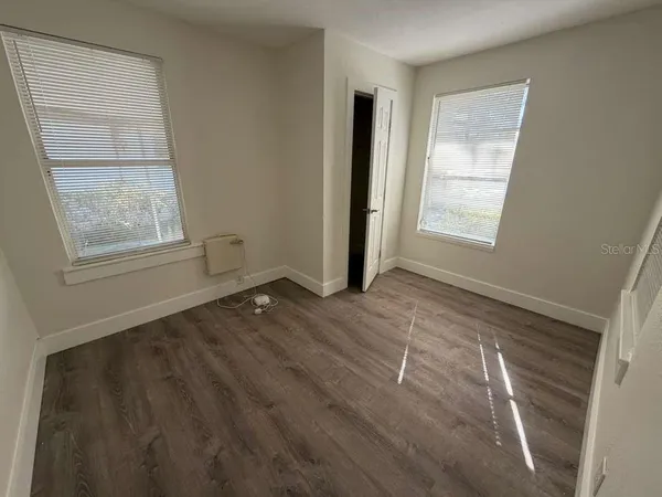 an empty room with windows