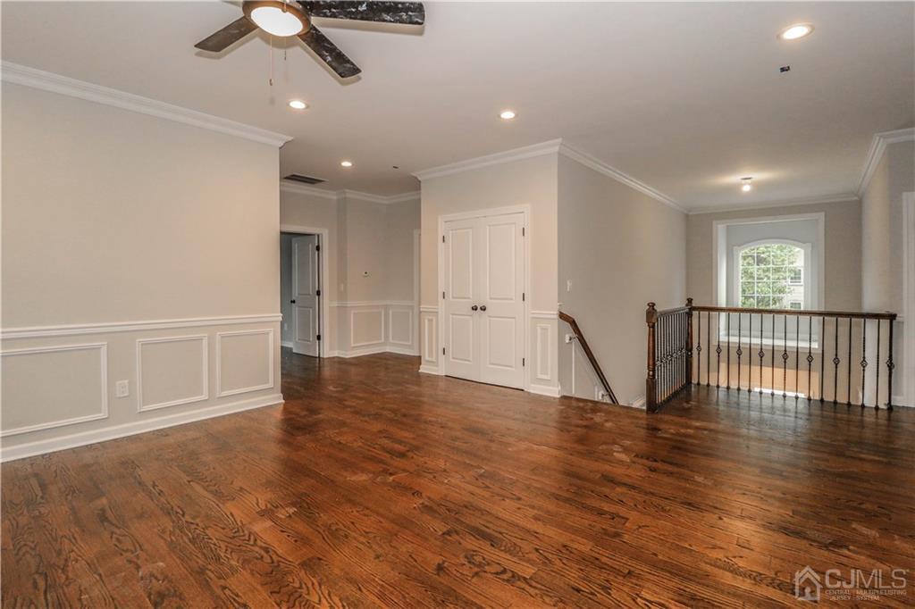 59 Middlesex Avenue Edison, NJ 08820 - Photo 14 of 25 a view of empty room with wooden floor and windows