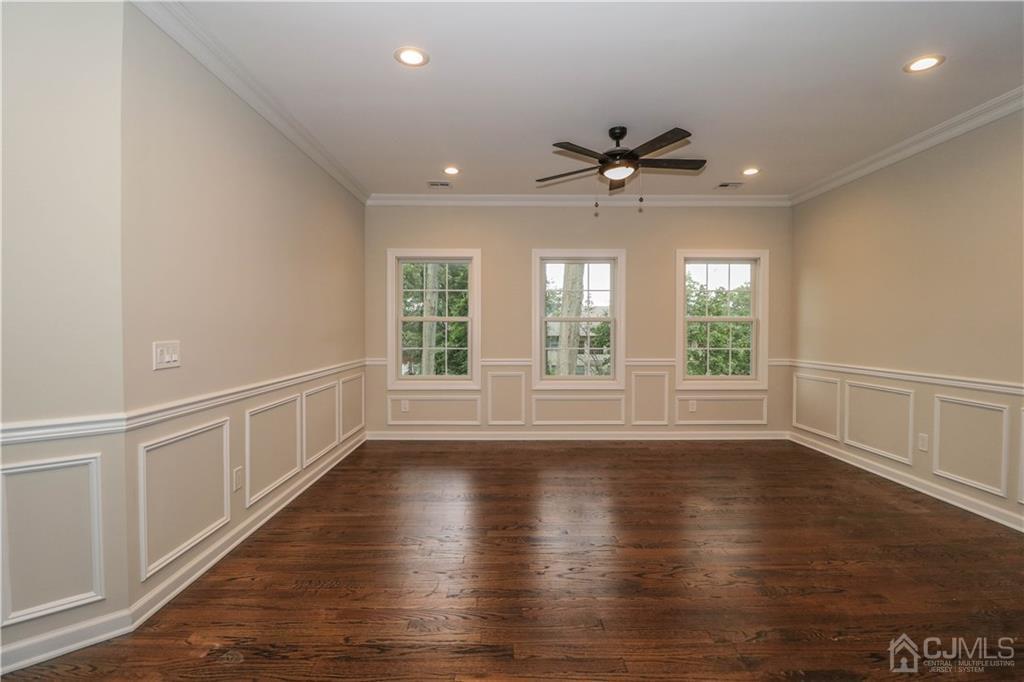 59 Middlesex Avenue Edison, NJ 08820 - Photo 15 of 25 wooden floor in an empty room with a window