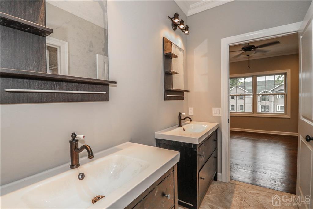 59 Middlesex Avenue Edison, NJ 08820 - Photo 18 of 25 a bathroom with a sink and a window