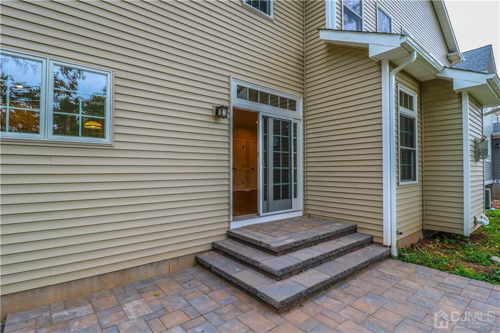 59 Middlesex Avenue Edison, NJ 08820 - Photo 24 of 25 a view of a white house with many windows
