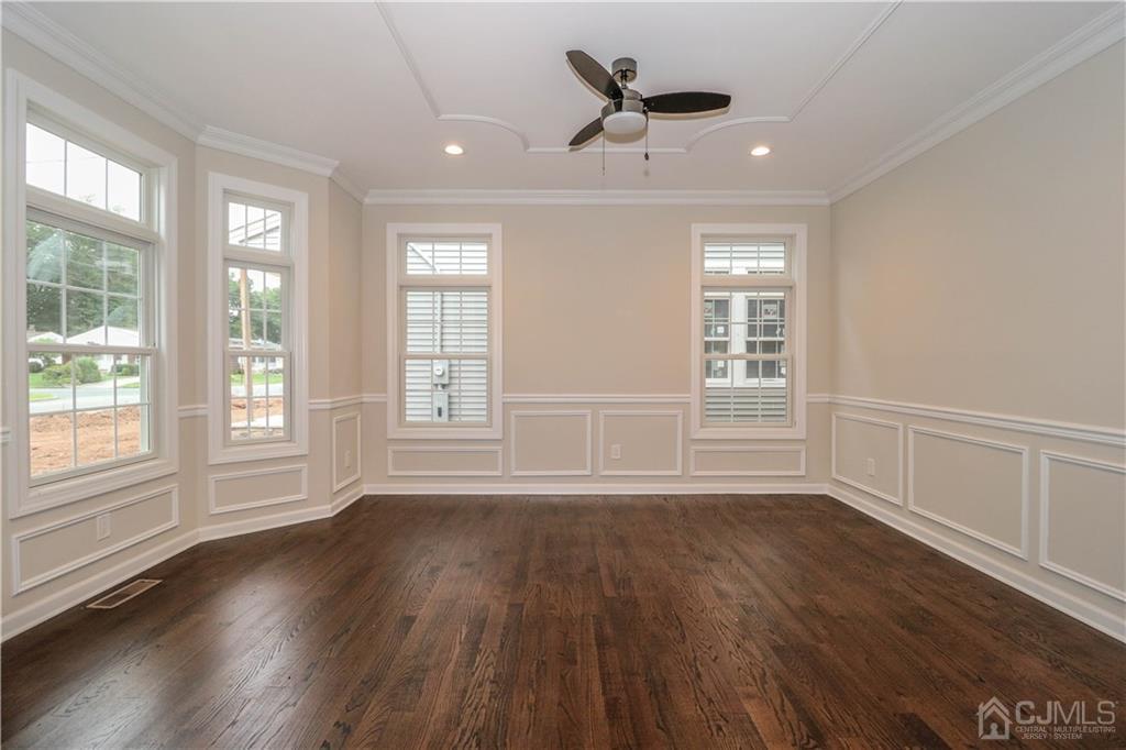 59 Middlesex Avenue Edison, NJ 08820 - Photo 5 of 25 a view of wooden floor and windows in a room