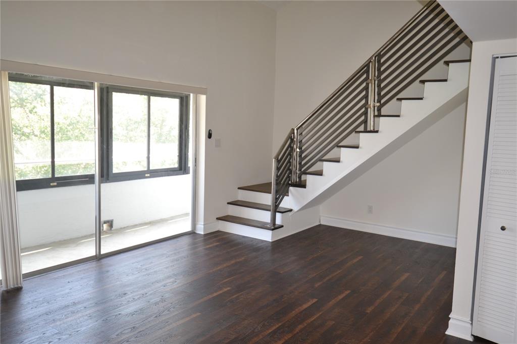 2585 Countryside Boulevard, Unit 4307 Clearwater, FL 33761 - Photo 16 of 32 a view of entryway with wooden floor