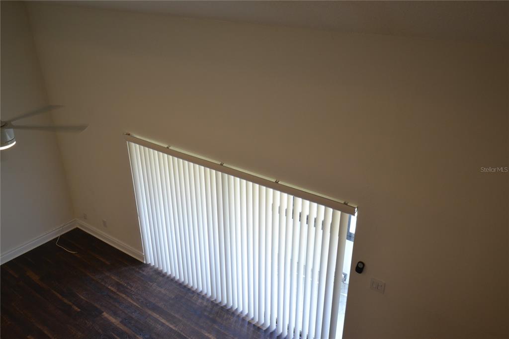 2585 Countryside Boulevard, Unit 4307 Clearwater, FL 33761 - Photo 32 of 32 a view of balcony with wooden floor