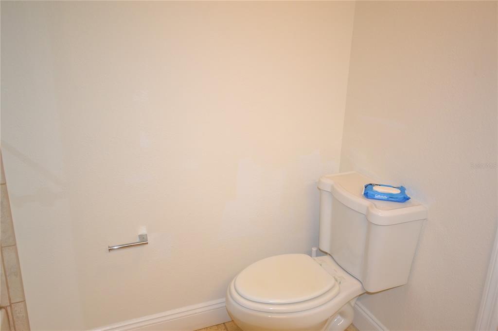 2585 Countryside Boulevard, Unit 4307 Clearwater, FL 33761 - Photo 10 of 32 a white toilet sitting next to a white sink